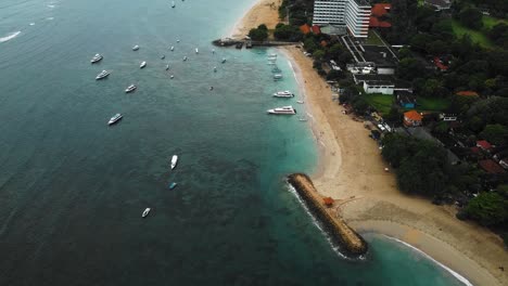 Beautiful-cinematic-Sanur-beach,-Bali-drone-footage-with-interesting-landscape,-fishing-boats-and-calm-weather