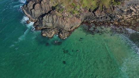 Top-View-Of-Green-Landscape-Of-Norries-Headland-And-Rocky-Coastline-Of-Norries-Cove-In-NSW,-Australia