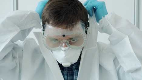 person preparing in protective gear
