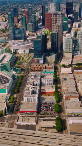 modern city downtown los angeles. travel aerial view of urban los-angeles buildings. vertical video