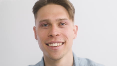 close up portrait of happy man smiling