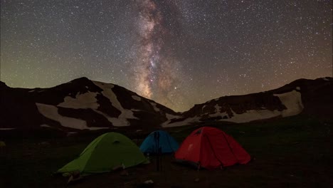 travel to hike the alborz zagros mountain range in iran to climb snow capped highlands camping at night in the nature outdoor trip under the stars of the starry night sky middle east milky way shining