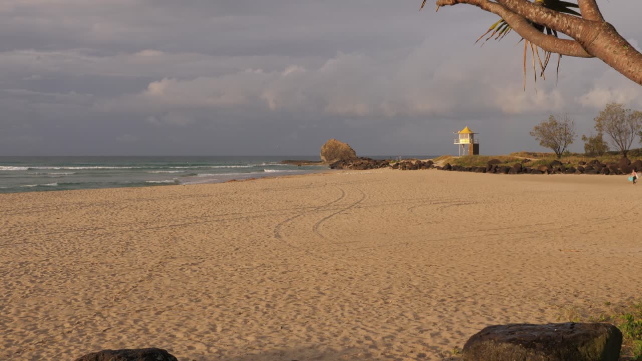 Beach Against Cloudy Sky At Sunset In Currumbin Alley, Gold Coast, Queensland, Australia - Wide Shot