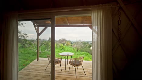 wooden deck watching the view in a b and b yurt tent