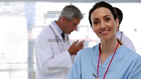 Caucasian-female-doctor-smiling.-Behind-her-there-are-two-caucasian-male-doctors-interacting-togethe
