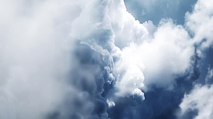 zoom in a thick cumulus cloud with a thunderstorm that struck inside