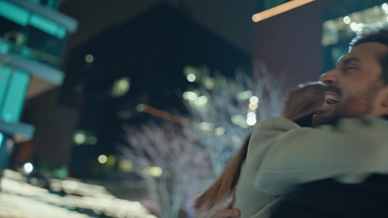 Closeup emotional business winners reacting successful deal night neighbourhood