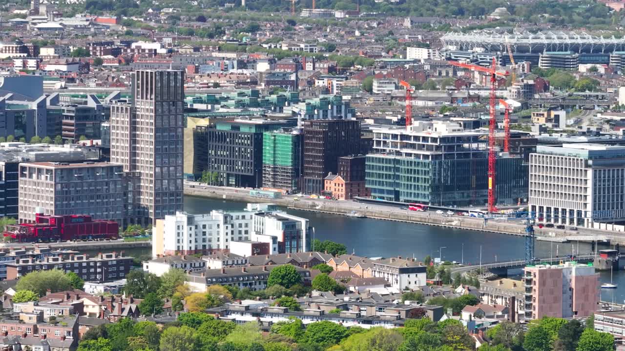Dublin North Wall Quay and Grand Canal Dock aerial tele over Docklands. Ireland, cityscape.