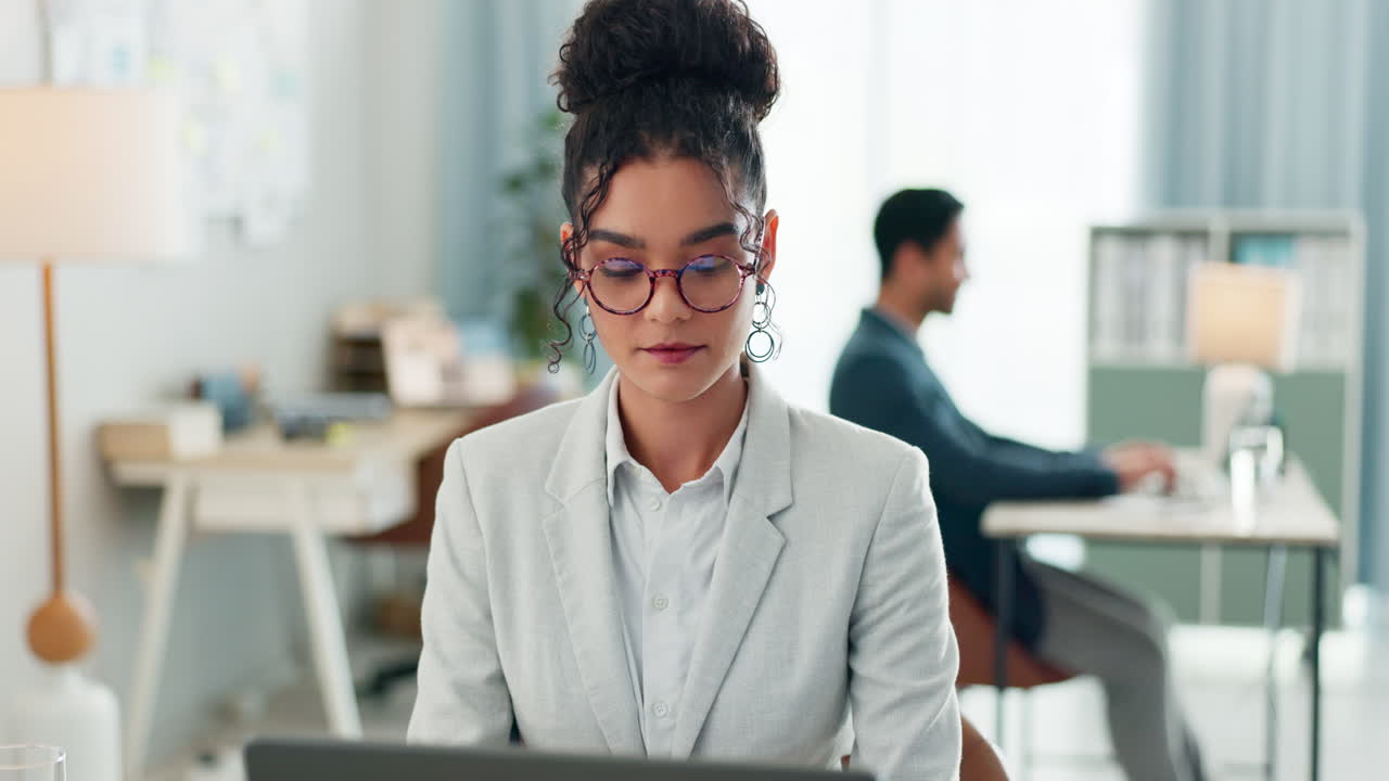 Woman with smile, laptop and typing in coworking