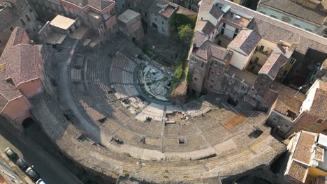 boom shot reveals greco romano theatre in catania, sicily, italy