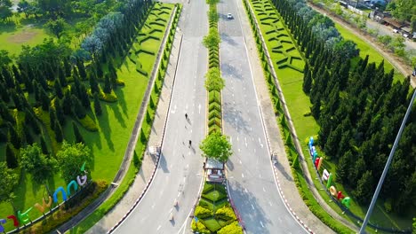 aerial view of royal park rajapruek approch to the road with beautiful green garden , chiang mai , thailand.