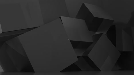 black futuristic cubes rotate on a minimalistic background. design and technology concept. 3d render 4k looped animation