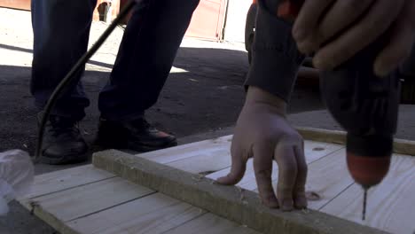 cutting wood with an electric hand saw. woodworking.