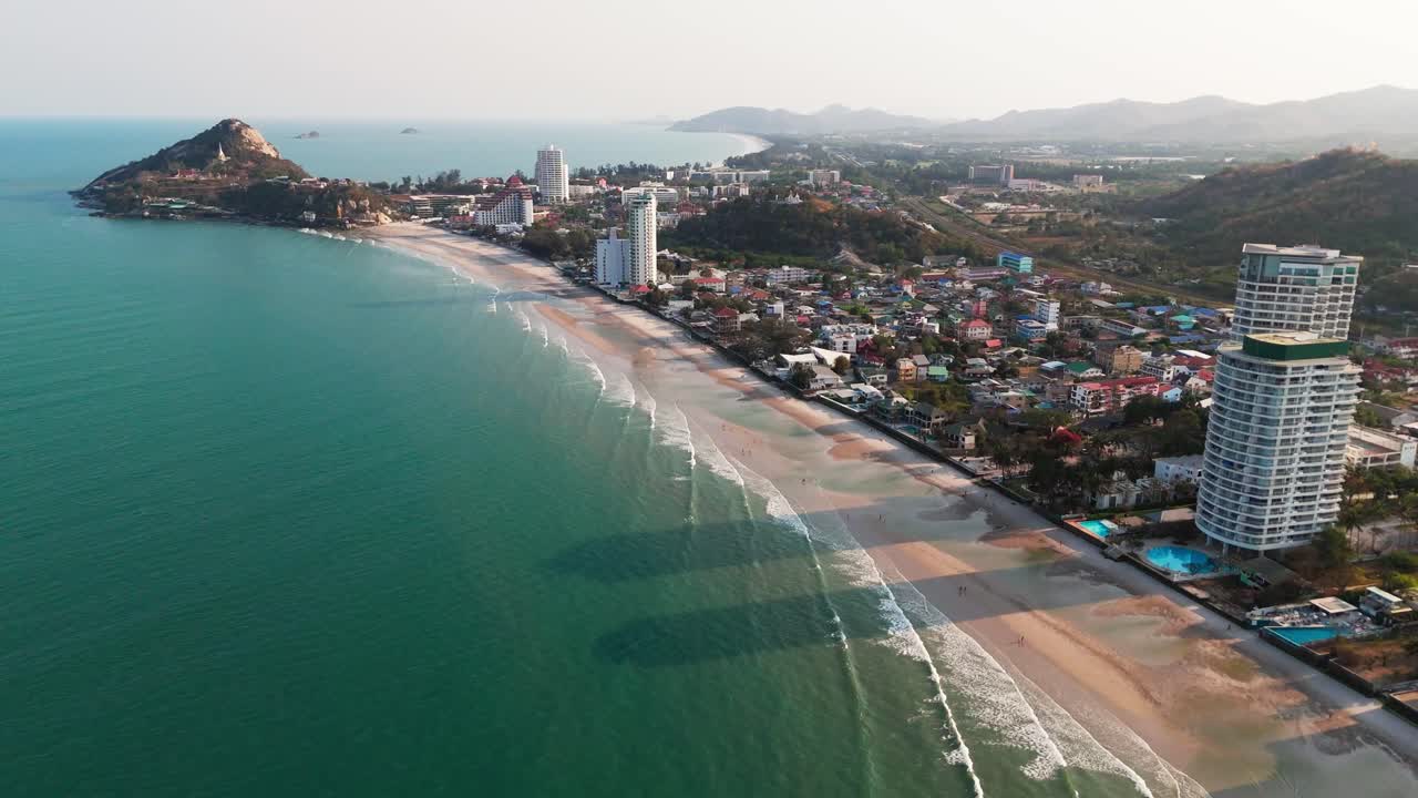 Aerial view of Hua Hin Beach in Thailand with blue sea water and white sand tropical beach waterfront luxury hotel resort