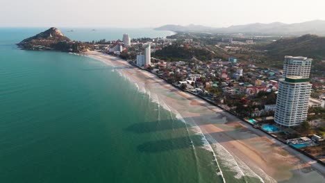 aerial view of hua hin beach in thailand with blue sea water and white sand tropical beach waterfront luxury hotel resort
