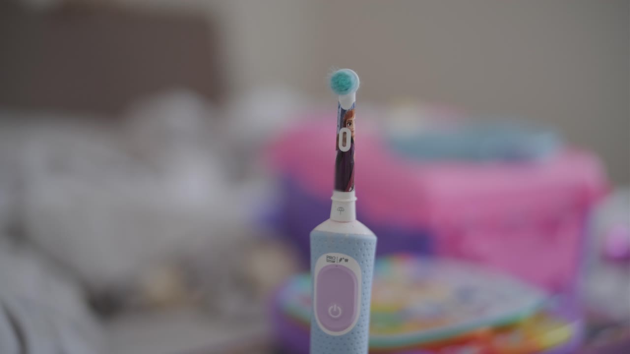 Close-up of a Vibrating Children's Electric Toothbrush