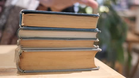 stack of old books on a table