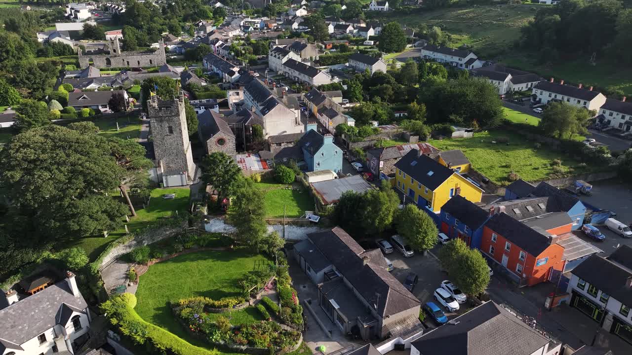 Drone view of street with traditional colourful houses in small Irish town of Carlingford
