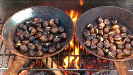 Castañas-Asadas-A-Fuego-Abierto,-Manjar-De-Temporada,-Cosecha,-4k-Uhd,-Sartén-De-Izquierda-A-Derecha