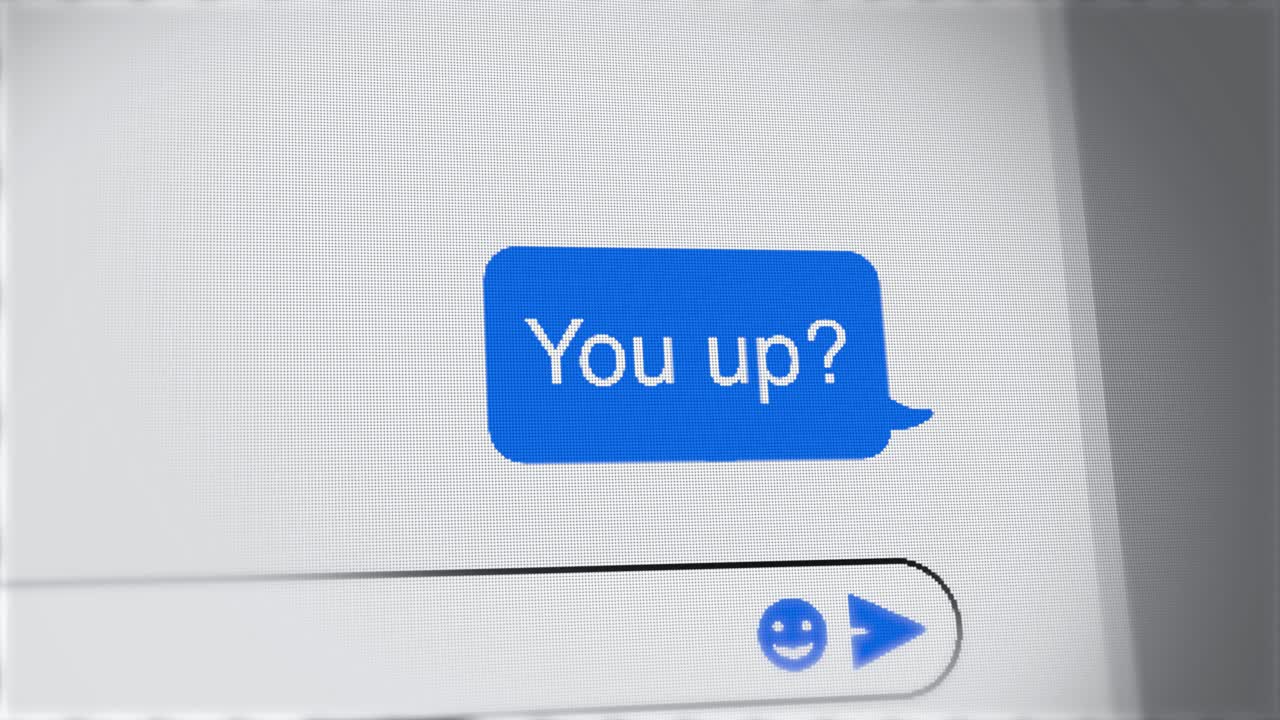 You up - text message close up on screen of chat on phone or computer