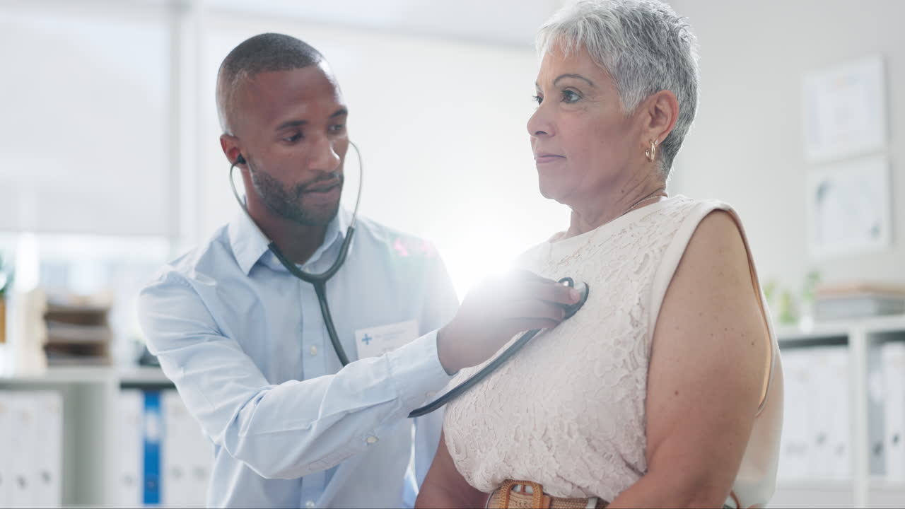 Doctor Examining Patient with Stethoscope