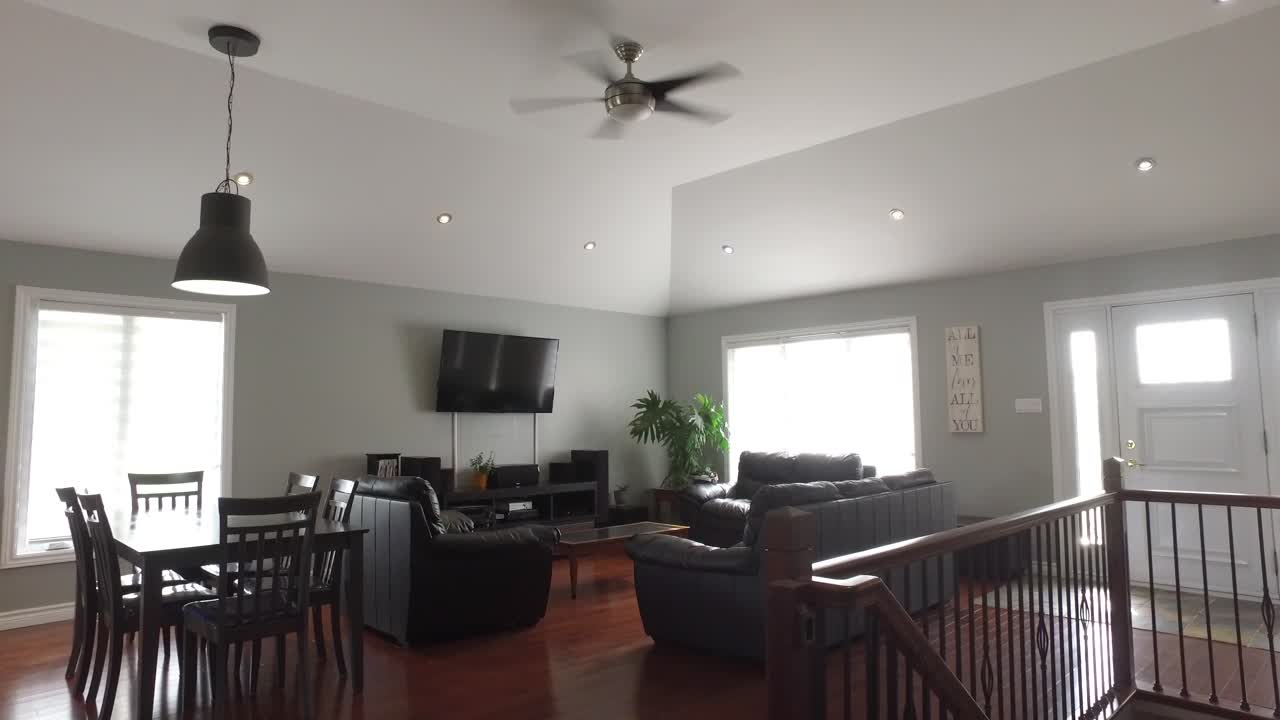 big modern living room with vaulted ceiling