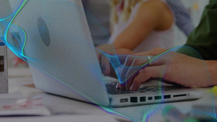 Office typist entering frame and typing, wave tracking laptop hands, zooming to ring for teamwork