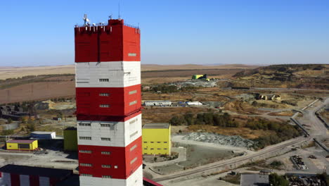 aerial view of mining facility with tower