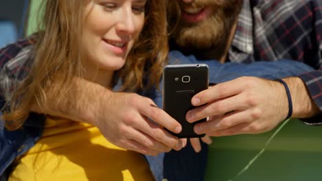 close-up of young couple discussing on mobile phone 4k