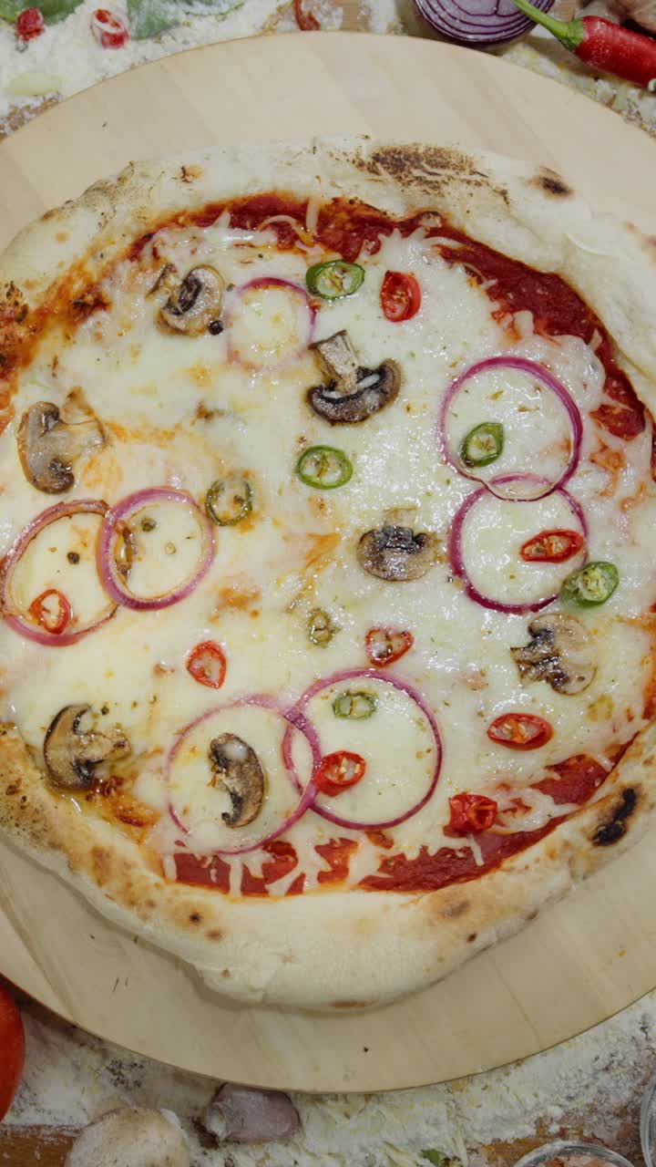 Delicious Pizza with Mushrooms, Onions, and Cheese
