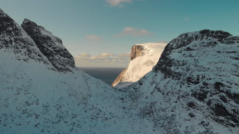 Drone-shot-of-mountains-in-winter-during-sunset