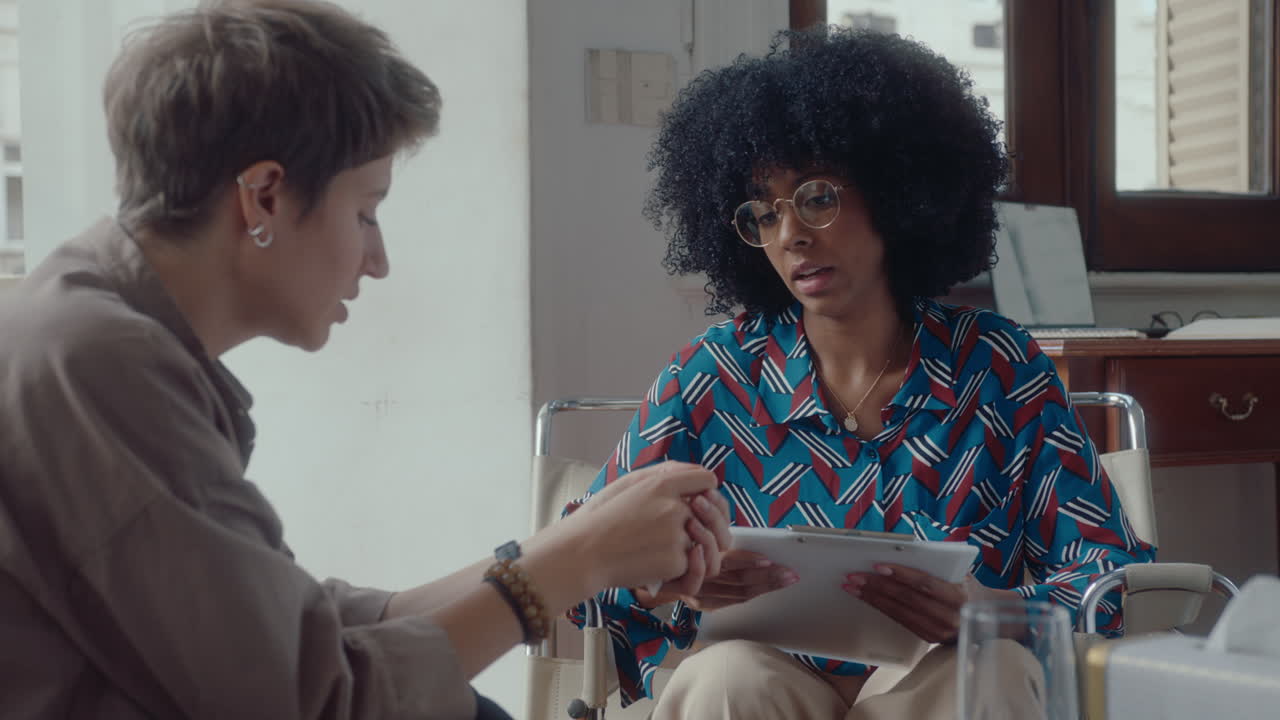 Depressed Woman Crying on Therapy Session with Psychologist