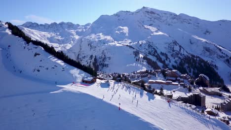 Drone-Passing-Over-A-Piste-and-Chairlift