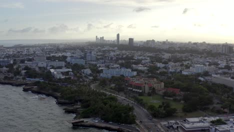 aerial drone forward on coast along malecon in santo domingo