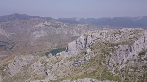 aerial shot of a rugged mountain landscape