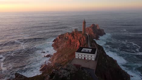 lighthouse aerial sunset view, galicia north spain coastline region atlantic sea ocean cabo vilan