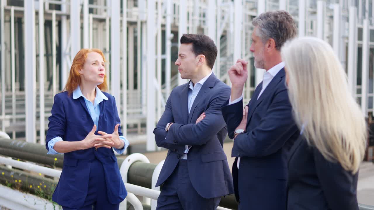 Business Professionals Discussing Outdoors