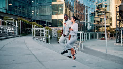 business professionals walking up stairs in modern city