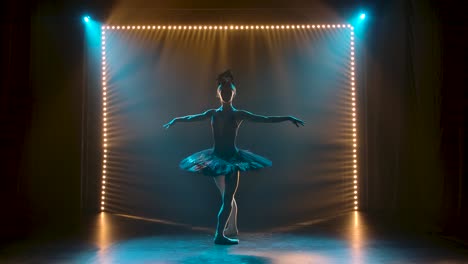 young ballerina in a black tutu