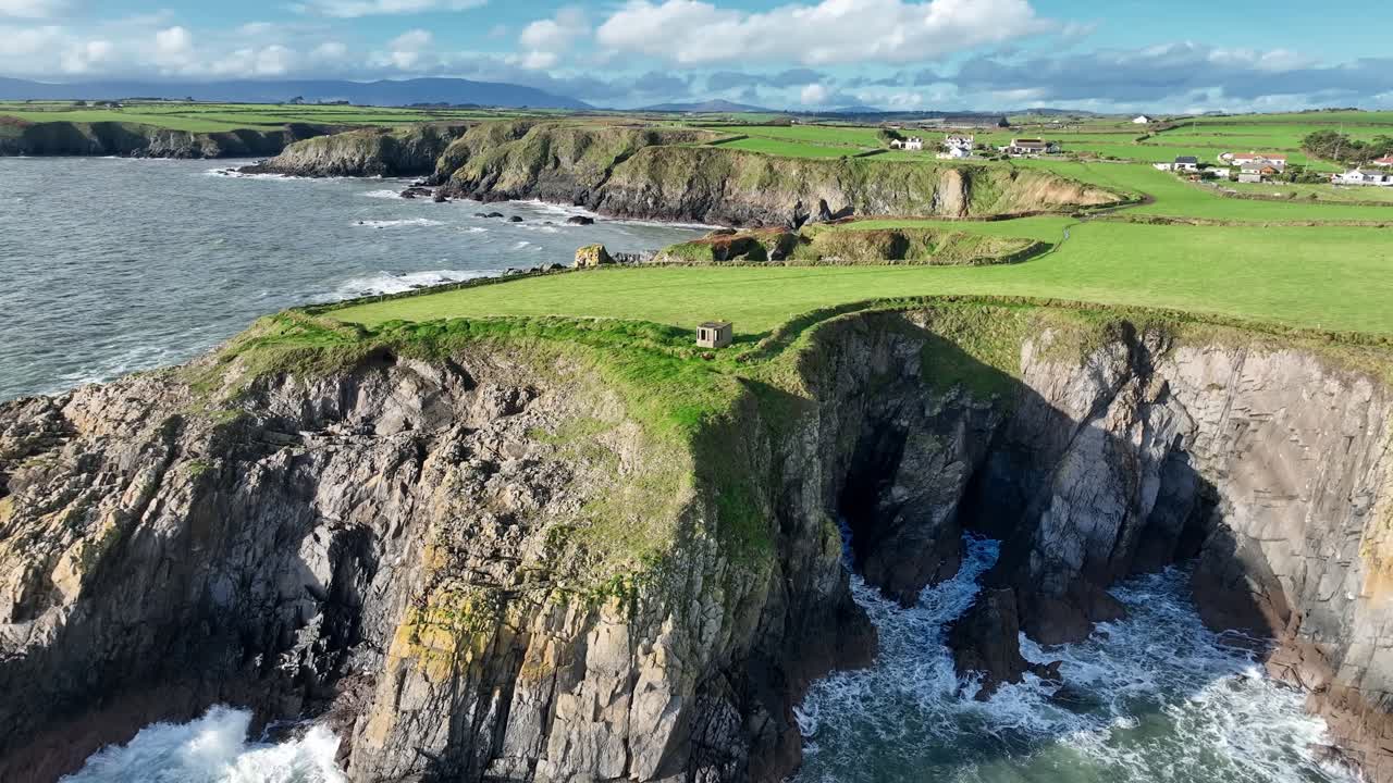 Ireland Epic Locations WW2 lookout hut at Dunabratin Head Copper coast Waterford drone pull away