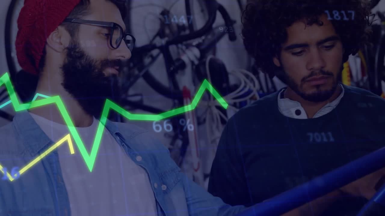 Coworkers rotating bike frame in tech repair shop, causing animated graphs and stats updating