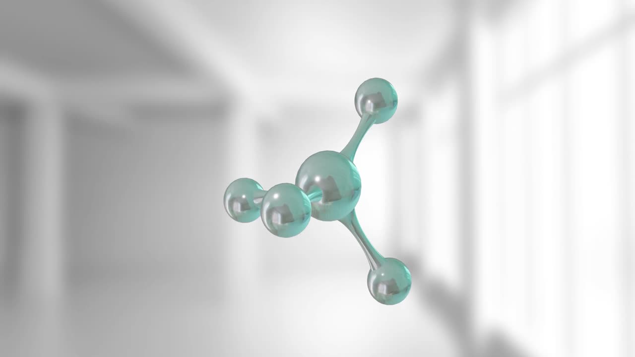 회색 배경 위에 있는 분자의 마이크로 모델의 애니메이션