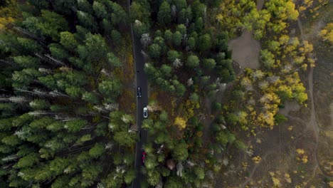 car traffic on mountain road in utah, aerial overhead tracking view