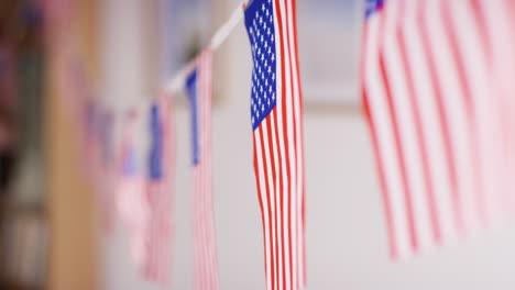 close up of american stars and stripes flag bunting for party celebrating 4th july independence day