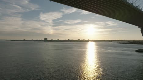 drone shot underneath bridge, ravenel bridge in charleston, sc