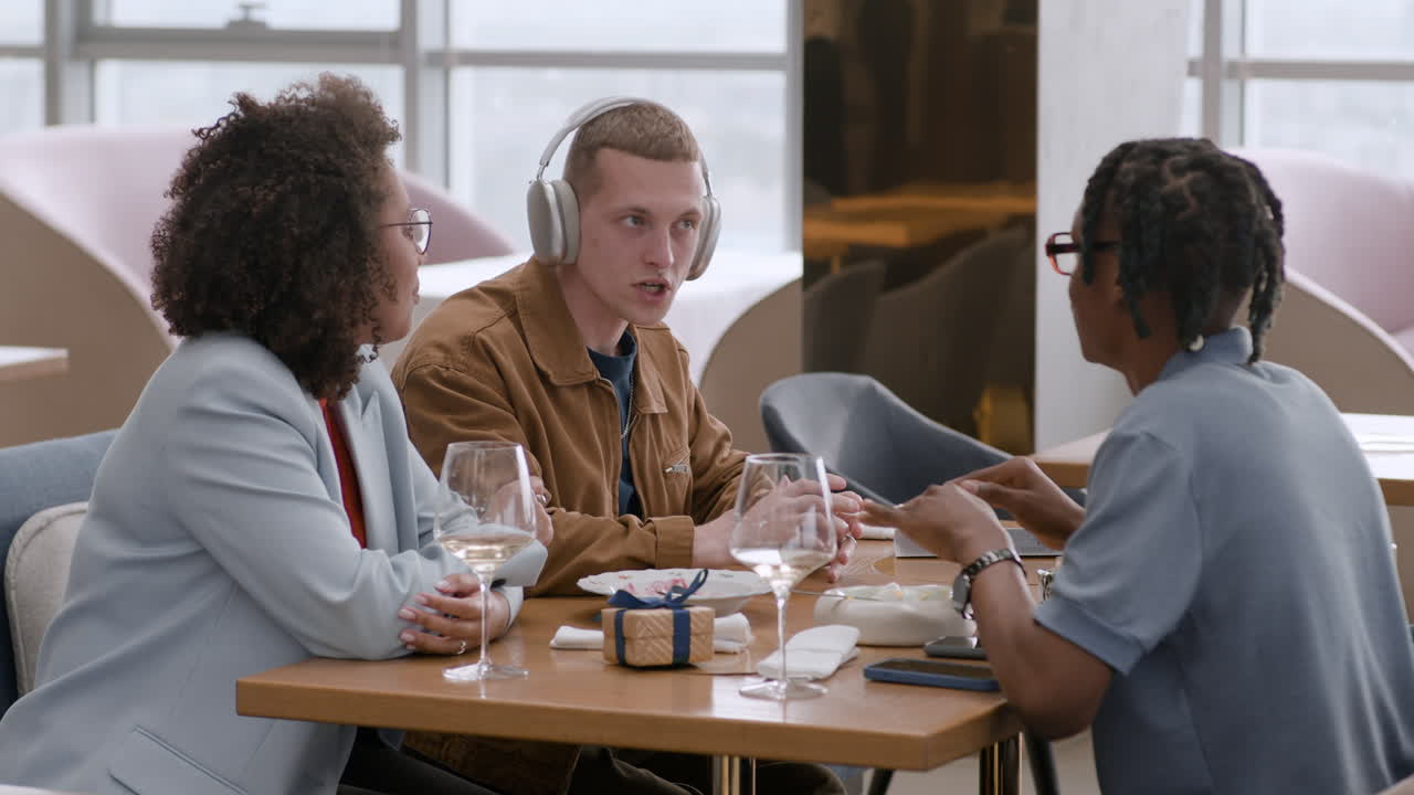 Friends Celebrating Lunch in a Restaurant