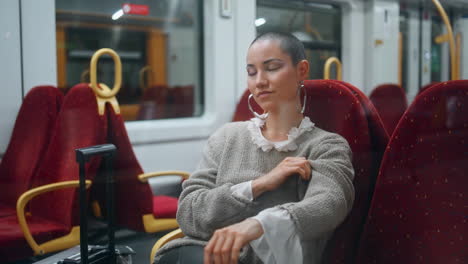 woman sitting on a train