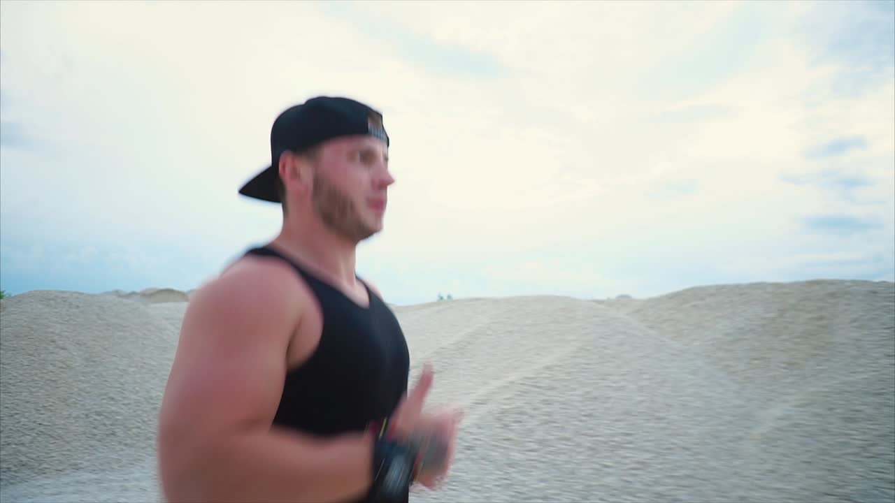 Man Running in a Desert Landscape