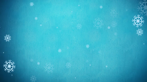 animación de un patrón navideño de copos de nieve sobre un fondo azul