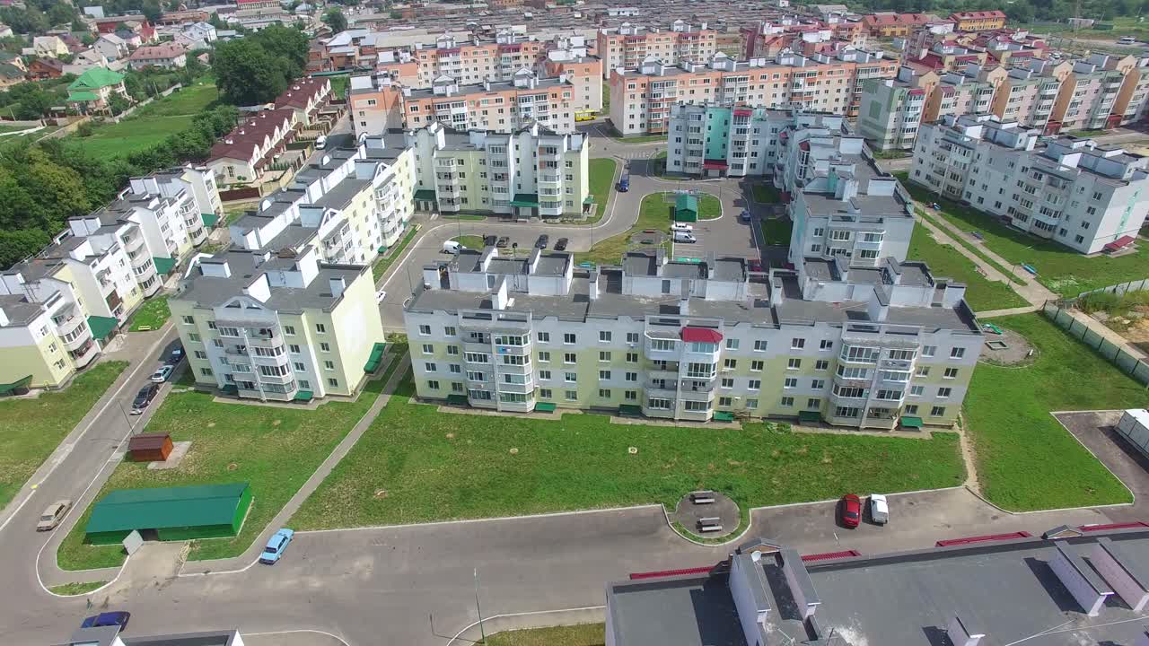 new high-rise buildings build on modern construction technologies. Infrastructure of new part of the city in aerial view